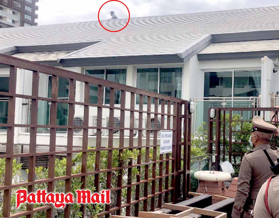 (Pattaya News 7) Jul 10 03 Stressed man clings on hotel building edge for 5 hours pic 1