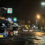 t-08 Pattaya tourists wade through flashfloods in Walking Street, Soi Bua khao on Sunday evening 10